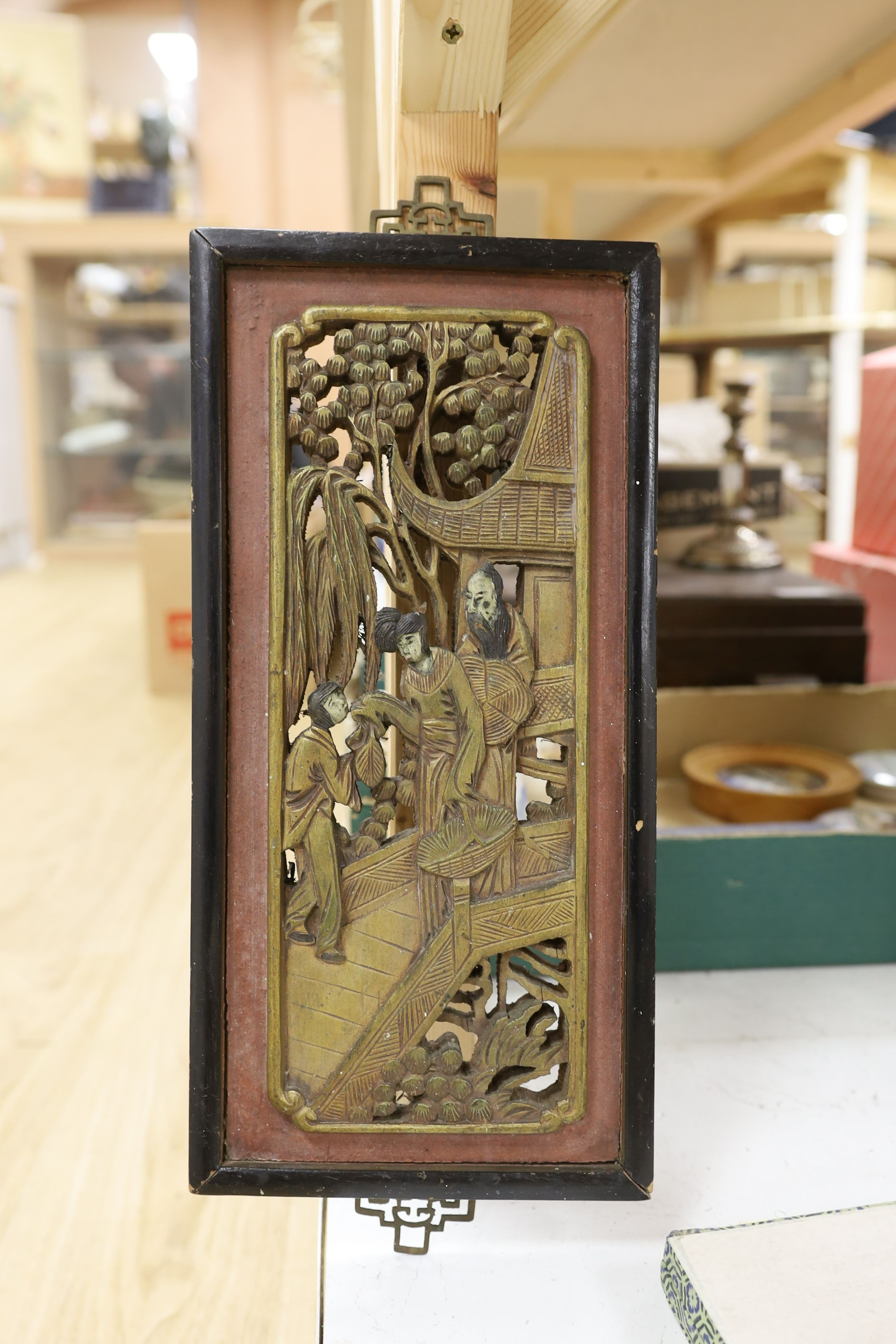 Two Chinese carved gilt wooden panels, a cased set of chopsticks, a boxed silk woven scroll and lacquer mahjong stands, a hand scroll and silk embroidery